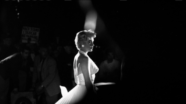 Image of Marilyn Monroe: All alone in a white halter dress