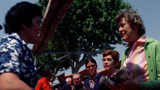 Image of Julia Child Samples Pizza