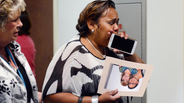 Image of Holmes Faces 24 Counts of First-Degree Murder